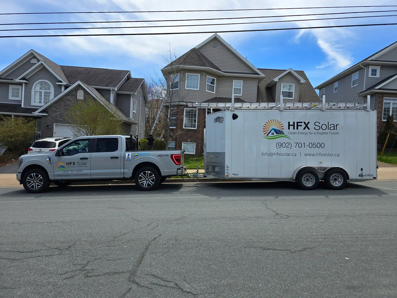 HFX Solar work truck and enclosed trailer wrapped as a matching pair