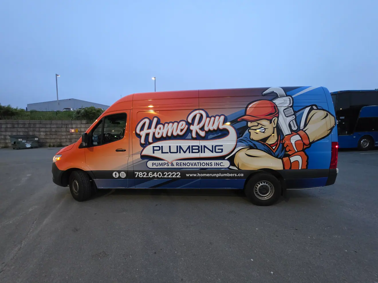 Home Run Plumbing Sprinter van, fully wrapped by ProFleet Graphics, parked on a Nova Scotia street