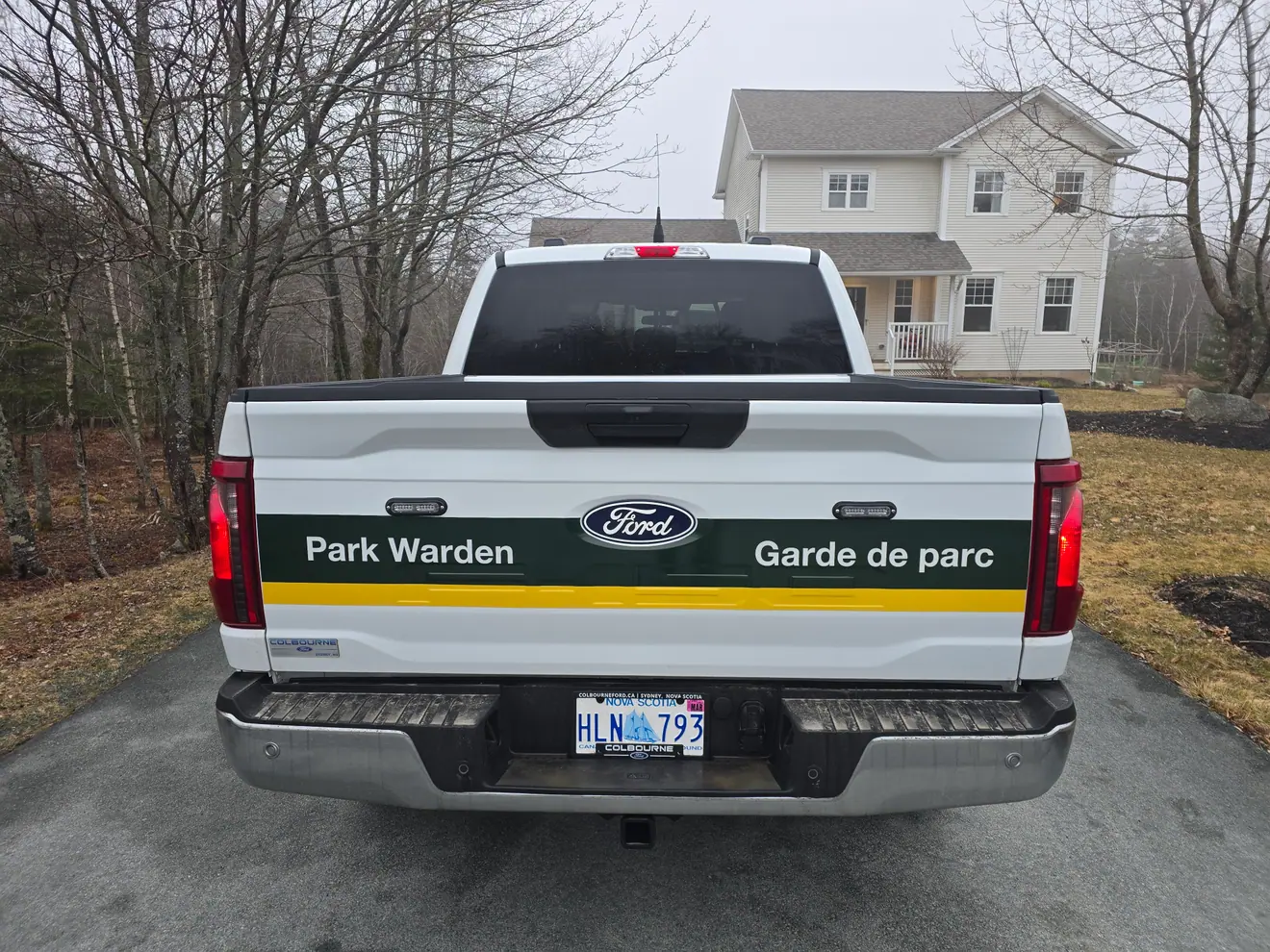 Parks Canada park warden truck lettered by ProFleet Graphics, parked in rural Nova Scotia