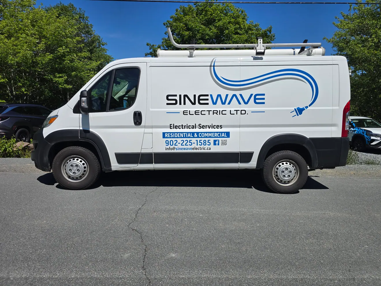 Sinewave Electric Ltd. graphics on a Ram ProMaster cargo van