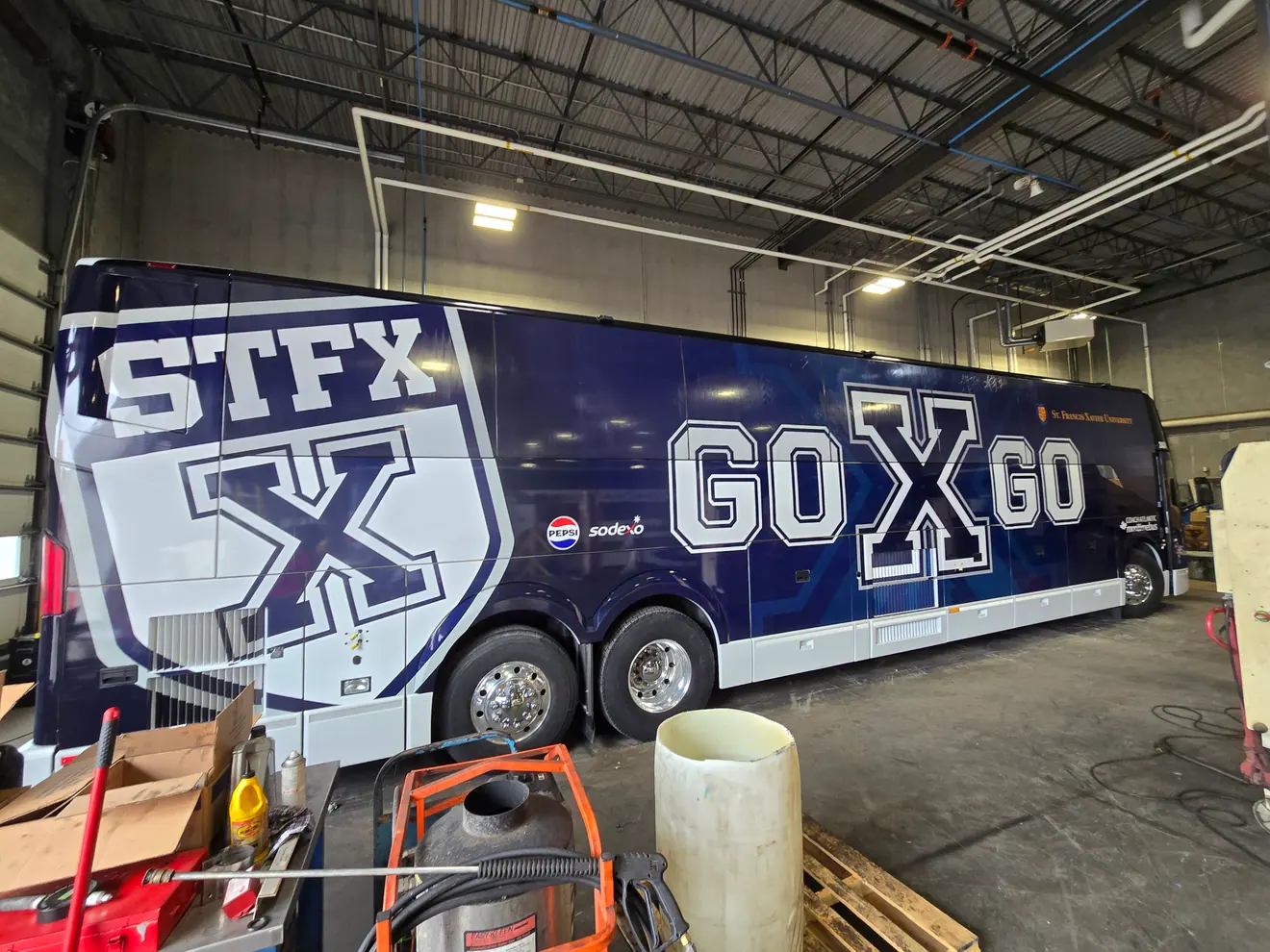 St. Francis Xavier University “Go X Go” coach wrap