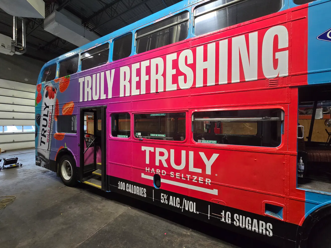 Truly Hard Seltzer “Truly Refreshing” double-decker bus wrap
