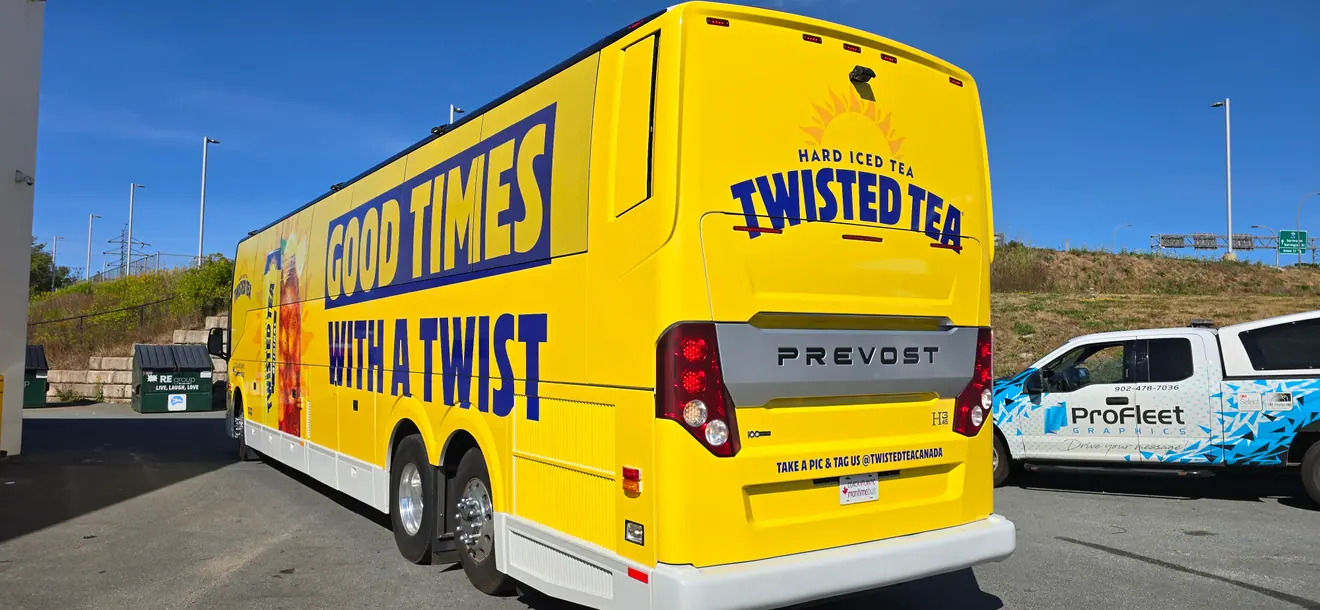 Full printed wrap on a Twisted Tea Prevost coach, designed and installed by ProFleet Graphics