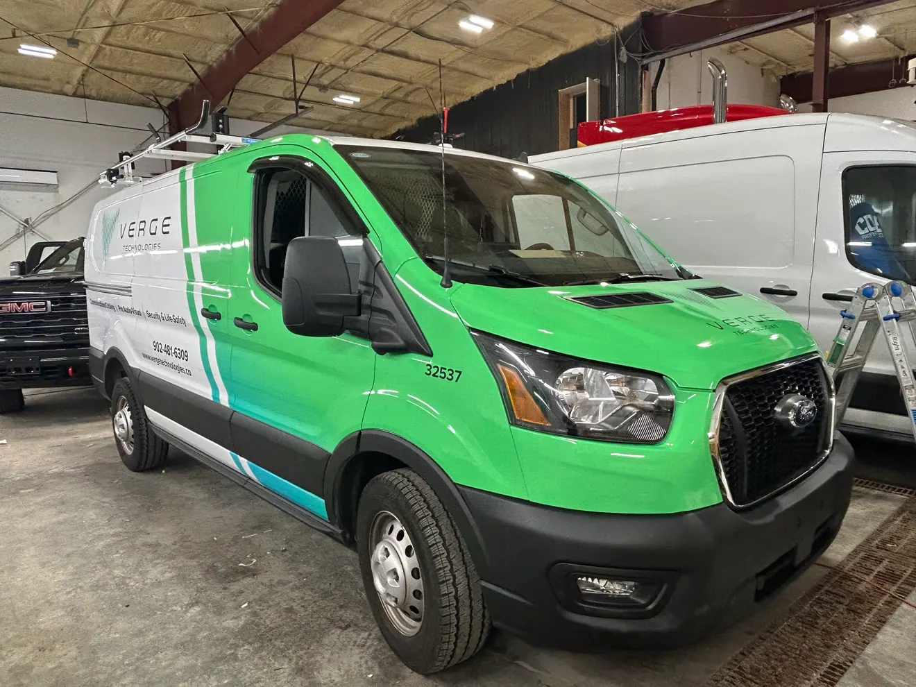 Verge Technologies partial wrap on a Ford Transit cargo van